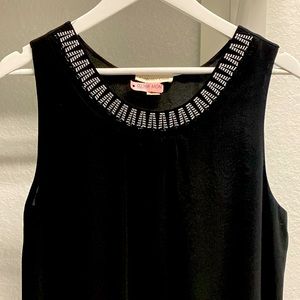 Sleeveless black blouse